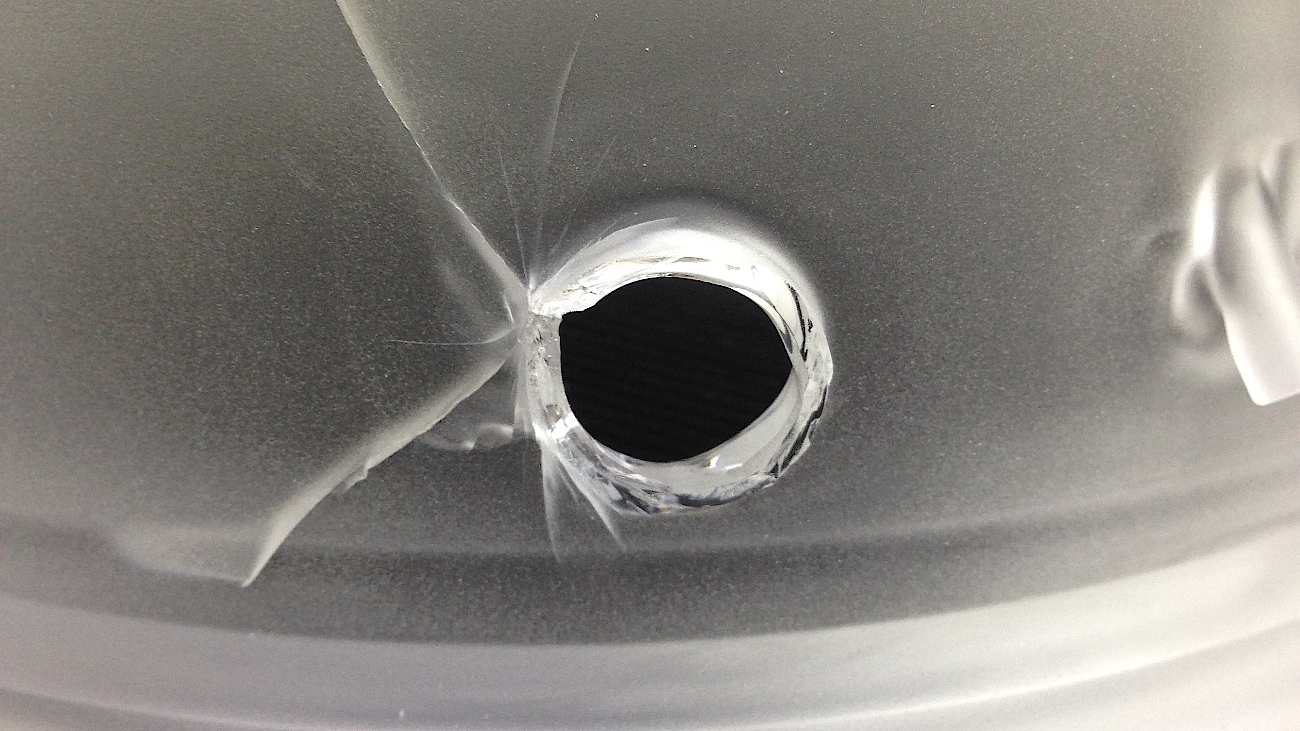 Repair A photo of a cracked element of quartz glass as used in Semiconductor Processes